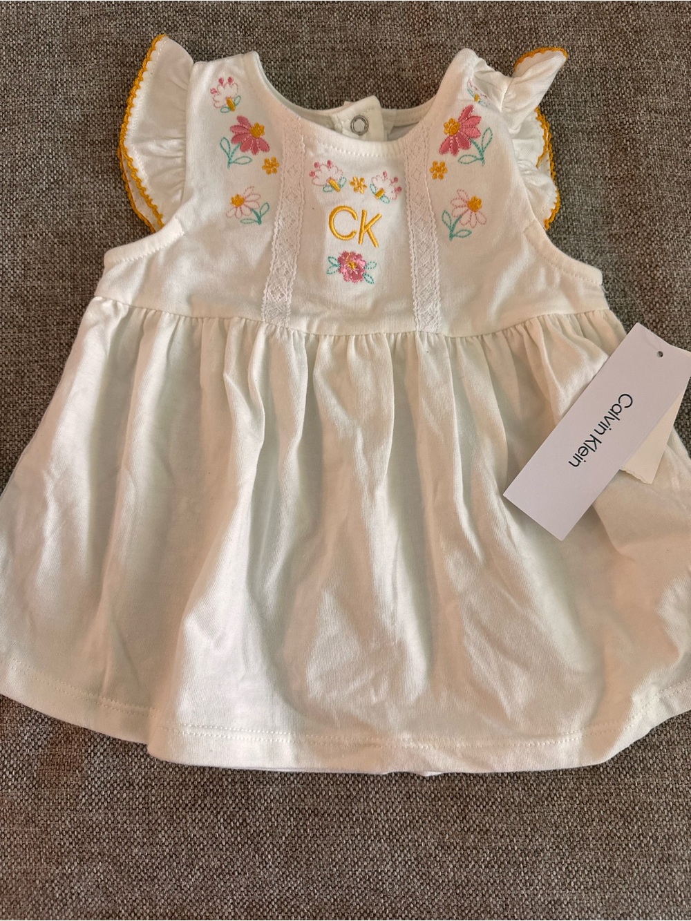 Calvin Klein White Baby Dress with Pink, Yellow and Green Floral Embroidery